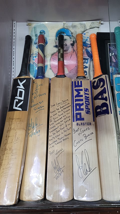 Bats signed by MS Dhoni on display at Paramjit Singh's place in Ranchi