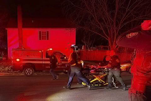 First responders carry an injured person away after an explosion at home, late Friday, Feb 16, 2024.