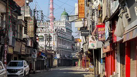 The market wears a deserted look as shops have been closed amid curfew in the Banbhoolpura area.