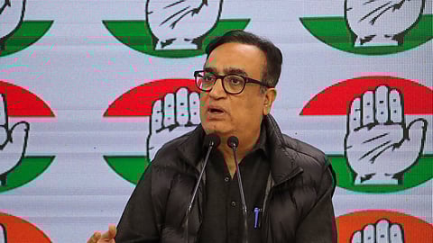 Congress party treasurer and spokesperson Ajay Maken addresses a press conference at All India Congress Committee (AICC) headquarters in New Delhi on February 16, 2024.