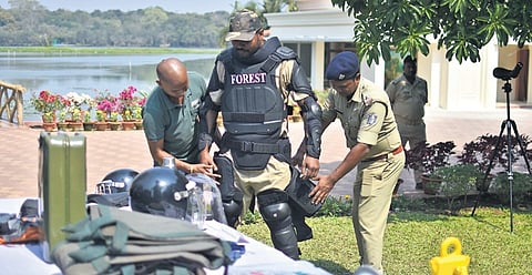 Forest officials check on equipment to be used by RRTs during man-animal conflicts and rescue operations, at Nandankanan Zoo on Tuesday