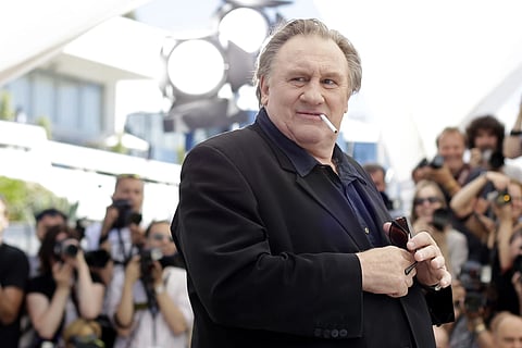 Gerard Depardieu poses for photographers during a photo call for a film Valley of Love at the 68th International Film Festival, Cannes, May 22, 2015.
