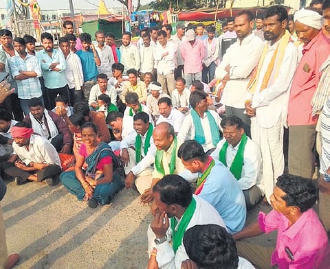 Family members and tribal body leaders stage a protest over the death of a Class 7 tribal student in front of RIMS, Adilabad, on Wednesday