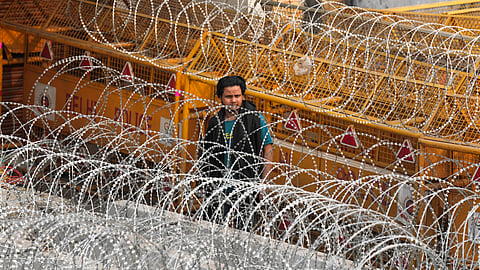 Multi-layered barricading in place at Singhu Border ahead of the scheduled 'Delhi Chalo' march by the protesting farmers, in New Delhi, Monday, Feb. 12, 2024.