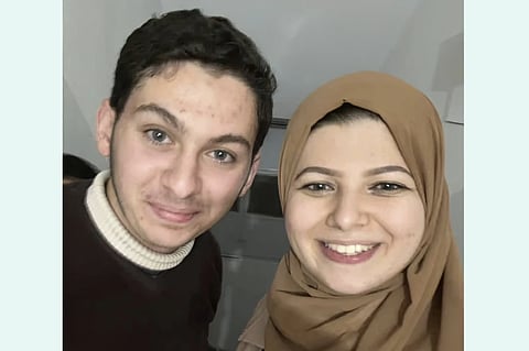 Yasmeen Elagha, right, with her cousin brother Borak Alagha, 28.