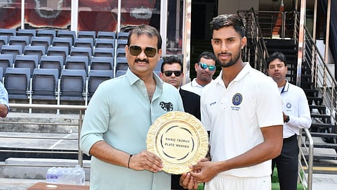 Hyderabad Cricket Association president Arishnapally Jagan Mohan Rao (L) with captain Tilak Varma