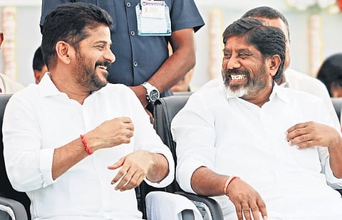 Chief Minister A Revanth Reddy and Deputy CM Mallu Bhatti Vikramarka share a lighter moment at an event on Saturday