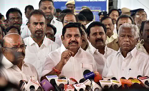 AIADMK leader K Palaniswami speaks to reporters after the walkout on Thursday