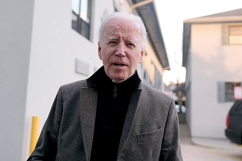 US President Joe Biden speaks with reporters as he leaves St. Edmund Roman Catholic Church in Rehoboth Beach, Del., Saturday, Feb. 17, 2024, after attending a Mass.
