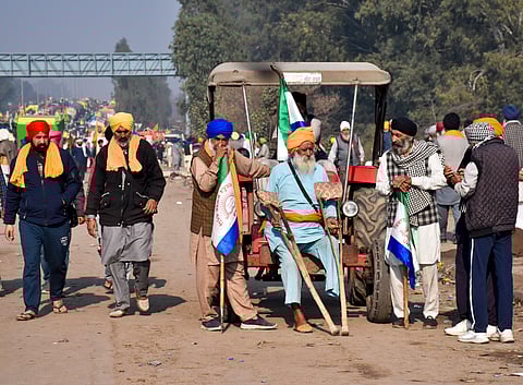 Farmers at the Punjab-Haryana Shambhu border during their 'Delhi Chalo' protest, near Patiala district, Friday, Feb. 16, 2024.