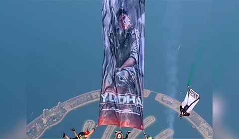 A team of skydivers descended from the skies to unveil the action thriller film 'Yodha' amidst the clouds, high above the azure waters of Dubai.