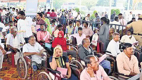 Specially-abled citizens wait in line for their turn at the Janaspandana programme at Vidhana Soudha in Bengaluru on Thursday |