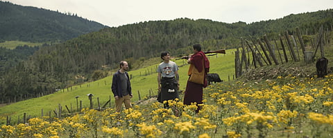 Harry Einhorn, from left, Tandin Sonam and Tandin Wangchuk in a scene from The Monk and the Gun.
