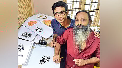 Appu Bhattathiri, recipient of the State Film Award for best editor, with his father and calligraphy artist Narayana Bhattathiri.