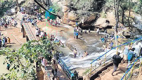 Tourists at Kothapalli waterfalls in Paderu division of ASR district.