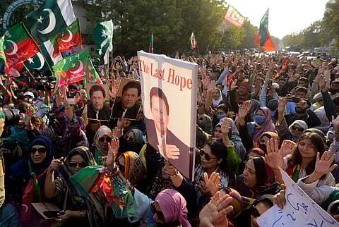 File Image- Supporters of imprisoned Pakistan's former Prime Minister Imran Khan's party chant slogans during a protest against the delaying result of parliamentary election by Pakistan Election Commission, in Karachi, Pakistan, Sunday, Feb. 11, 2024.
