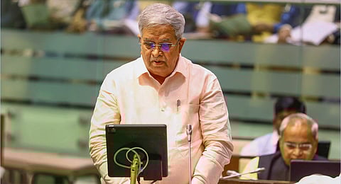 Gujarat Finance Minister Kanubhai Desai presents the state budget in the assembly, in Gandhinagar, Friday, Feb. 2, 2024.