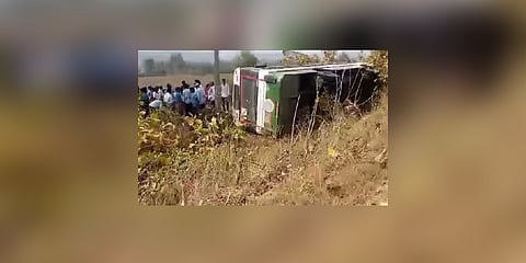 RTC Bus overturned in Talamadugu mandal on Monday.