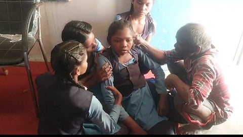 Visuals of Ojhas (faith-healers) treating the concerned girl students through Jhaad-Phoonk (superstitious practices) for “driving away evil spirits”.