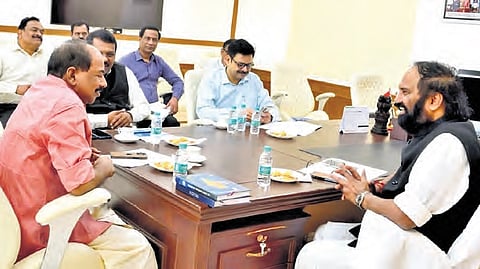 Civil Supplies Minister N Uttam Kumar Reddy speaks to his counterpart from Kerala
GR Anil at his office in the Secretariat on Friday