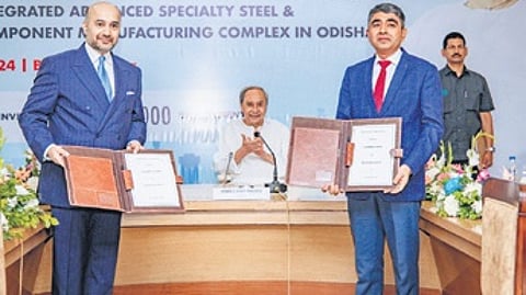 Director of Kalyani Steels Amit Kalyani and MD of IPICOL Bhupendra Singh Poonia with the MoU documents in the presence of Chief Minister Naveen Patnaik in Bhubaneswar