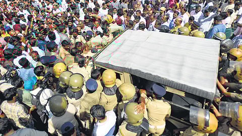 Protesters block a jeep of the forest department in Pulpally town in Wayanad on Saturday | Express