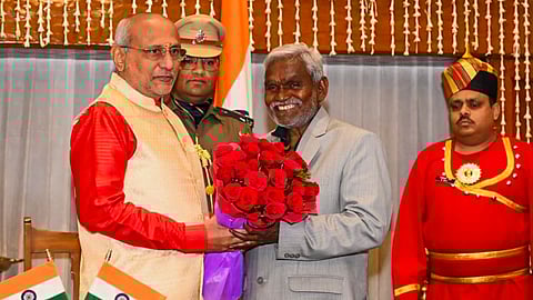 Governor CP Radhakrishnan greets newly sworn-in Chief Minister Champai Soren after the oath ceremony, at Raj Bhawan in Ranchi, Friday, Feb. 2, 2024.