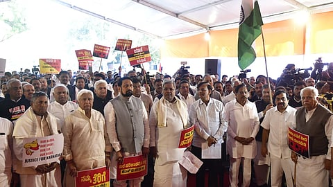 Karnataka Chief Minister Siddaramaiah along with other top politicians during a protest against the alleged injustices meted out to the state in the Union Budget, at Jantar Mantar in New Delhi on Feb 7, 2024.