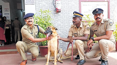 Ernakulam Rural SP Vaibav Saxena with Rooni.