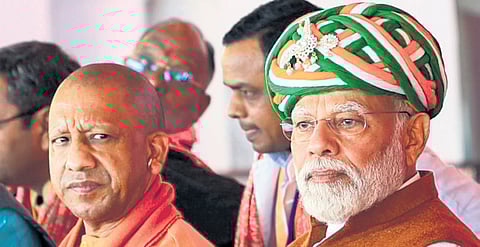 PM Narendra Modi with UP CM Yogi Adityanath.