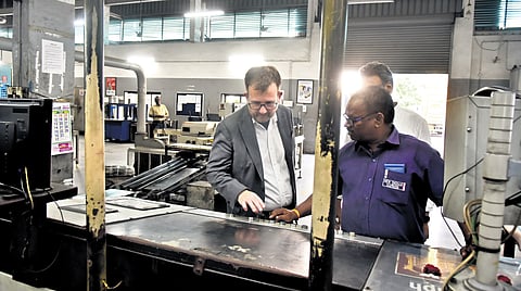 Hodges during his visit to TNIE printing press