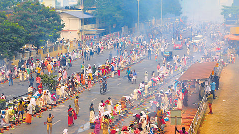 Thousands of women gather to offer Pongala at Thampanoor on Sunday.