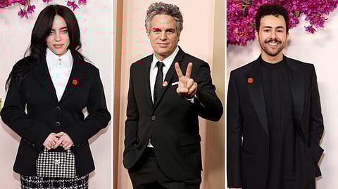 Hollywood celebs Billie Eilish, Mark Ruffalo, and Ramy Youssef showed up on the red carpet wearing red pins by Artists4Ceasefire.