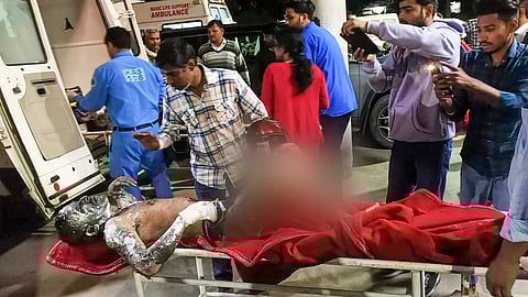 An injured being taken to a hospital after a blast occured in the boiler of a spare parts manufacturing facility, in Rewari district, Saturday.