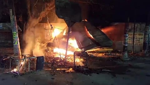 A structure set on fire by angered locals after a barber killed two boys, in Budaun, Uttar Pradesh.