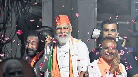 Prime Minister Narendra Modi, along with Malkajgiri Lok Sabha candidate Etela Rajender, holds a roadshow in Secunderabad on Friday