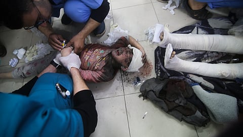 Palestinians wounded in the Israeli bombardment are treated in a hospital in Rafah, Gaza Strip. Sunday, March 24, 2024.
