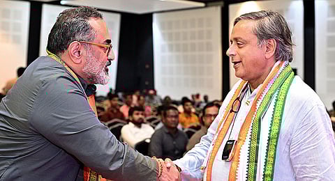 Union Minister & BJP candidate Rajeev Chandrasekhar with Congress candidate Shashi Tharoor during a function, ahead of the Lok Sabha elections, in Thiruvananthapuram, Monday, March 11, 2024.
