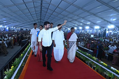 Chief Minister A Revanth Reddy waves to the crowd as he arrives at Parade Grounds in Secunderabad to launch Mahila Shakti, a new women empowerment policy, on Tuesday
