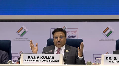 Chief Election Commissioner Rajiv Kumar flanked by Election Commissioners Gyanesh Kumar and SS Sandhu.