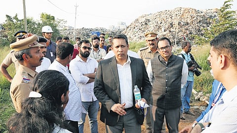 High Court judges Bechu Kurian Thomas and Gopinath P reviewing the work at the Brahmapuram waste treatment plant on Thursday