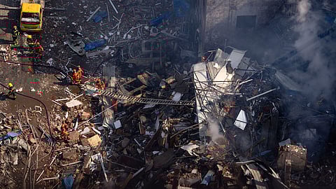 Firefighters work the scene of an explosion in Sanhe city in northern China's Hebei province.
