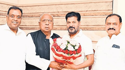 Senior Congress leader V Hanumantha Rao with CM A Revanth Reddy