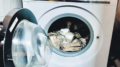 A part of the Rs 2.54 crore of unaccounted cash found in a washing machine during ED raids at the premises of a well-known company and some directors on Tuesday