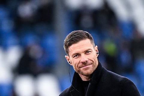 Bayer Leverkusen's Spanish head coach Xabi Alonso is interviewed prior to the German first division Bundesliga football match between SV Darmstadt 98 and Bayer 04 Leverkusen on February 3, 2024.