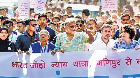 Rahul along with Priyanka, Tushar Gandhi (in green), great-grandson of Mahatma, at a padayatra in Mumbai on Sunday