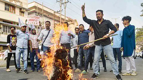 Activists of the Asom Jatiyatabadi Yuba Chatra Parishad (AJYCP) stage a protest after the central government notified the rules for implementation of the Citizenship (Amendment) Act, 2019, in Guwahati