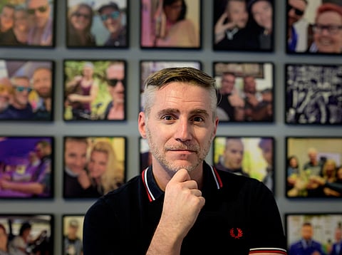 Austrian consultant Michael Woditschka, 44, poses for a picture in his apartment in Vienna, Austria on March 7, 2024. Austrian consultant Michael Woditschka well remembers the fateful day when he was summoned by police over his relationship with a teenage boy and subsequently convicted in court.