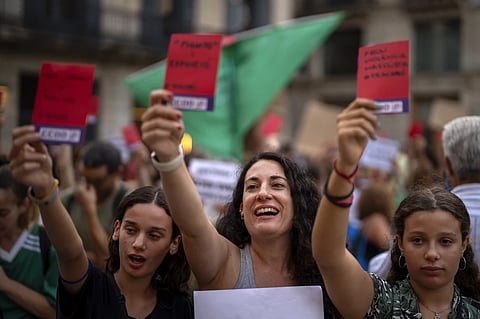 Demonstrators shouts slogans during a protest against the President of Spain’s soccer federation Luis Rubiales and to support Spain’s national women’s soccer player Jenni Hermoso in Barcelona, Spain, Monday, Sept. 4, 2023.