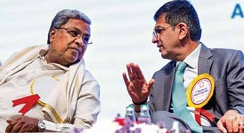 Chief Justice of India D Y Chandrachud and Karnataka Chief Minister Siddaramaiah at the 21st Biennial State Level Conference of Judicial Officers on the theme of Equity and Excellence for Futuristic Judiciary, in Bengaluru, Saturday, March 23, 2024.